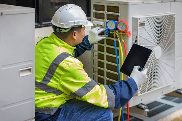 Professional Air Duct Cleaning technician working in Mc Neil, TX